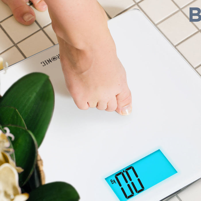 Zoomgoods BS403 digital weighing scale preparing to measure weight on bathroom tile floor