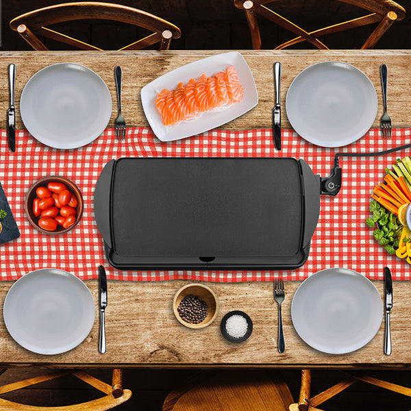 Zoomgoods GP20 electric teppanyaki grill on table surrounded by food