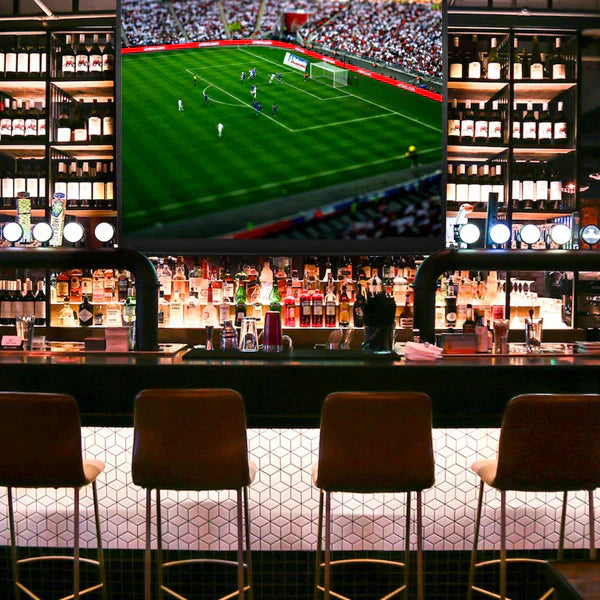 Football match being shown in a pub using the Zoomgoods projector screen