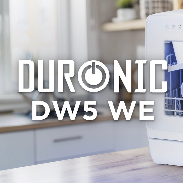 Aesthetic kitchen countertop with the Zoomgoods DW5 WE compact white dishwasher cleaning dishes