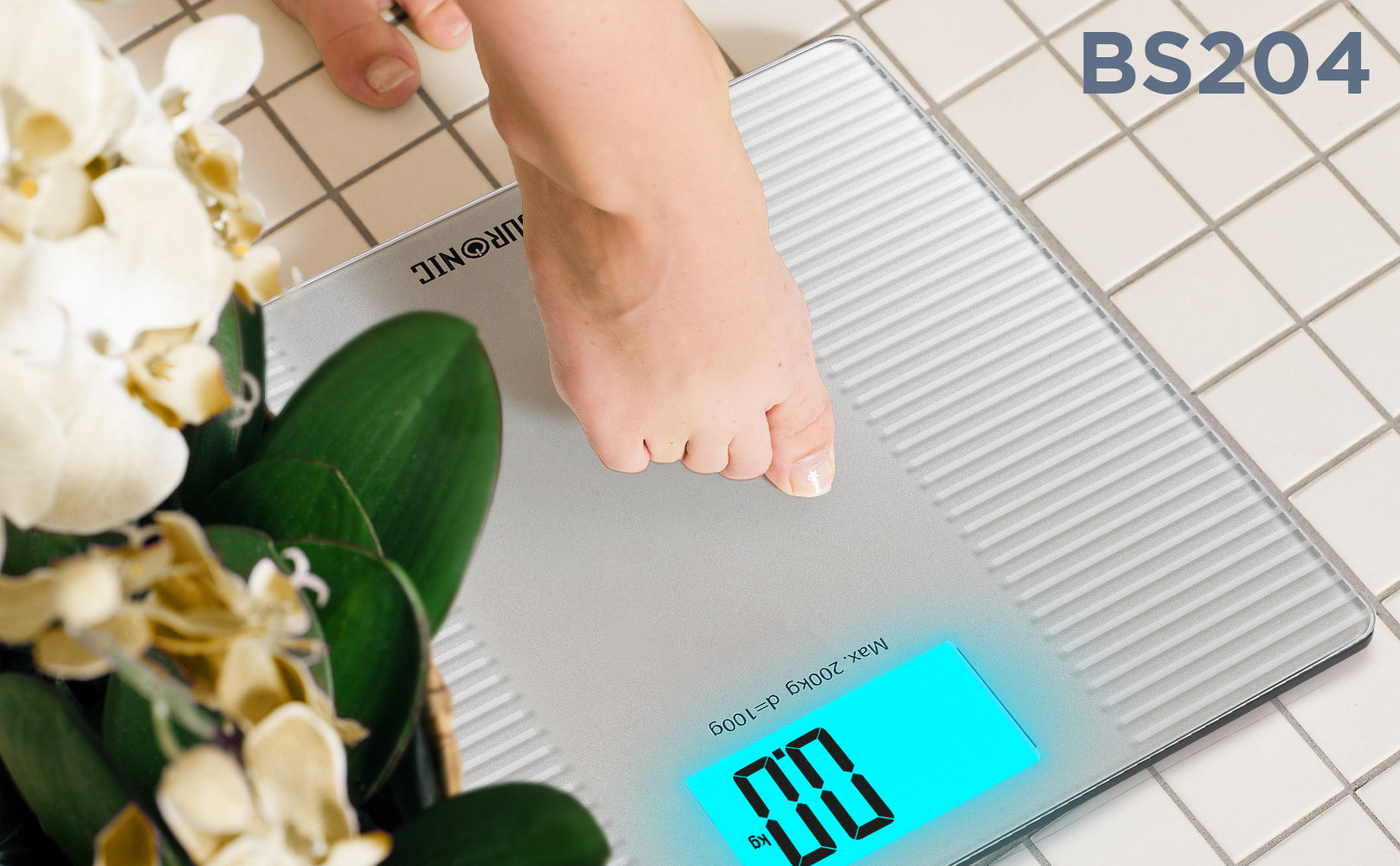 Zoomgoods BS204 digital bathroom scale calibrating weight on a tile floor