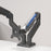 Zoomgoods Dual Monitor Stand with dual-arm monitor mount in matte black, featuring a transparent panel that reveals a blue mechanical spring
