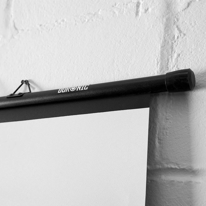 Zoomgoods BPS60 projection screen mounted on white wall with fixings provided for office, home theatre, school