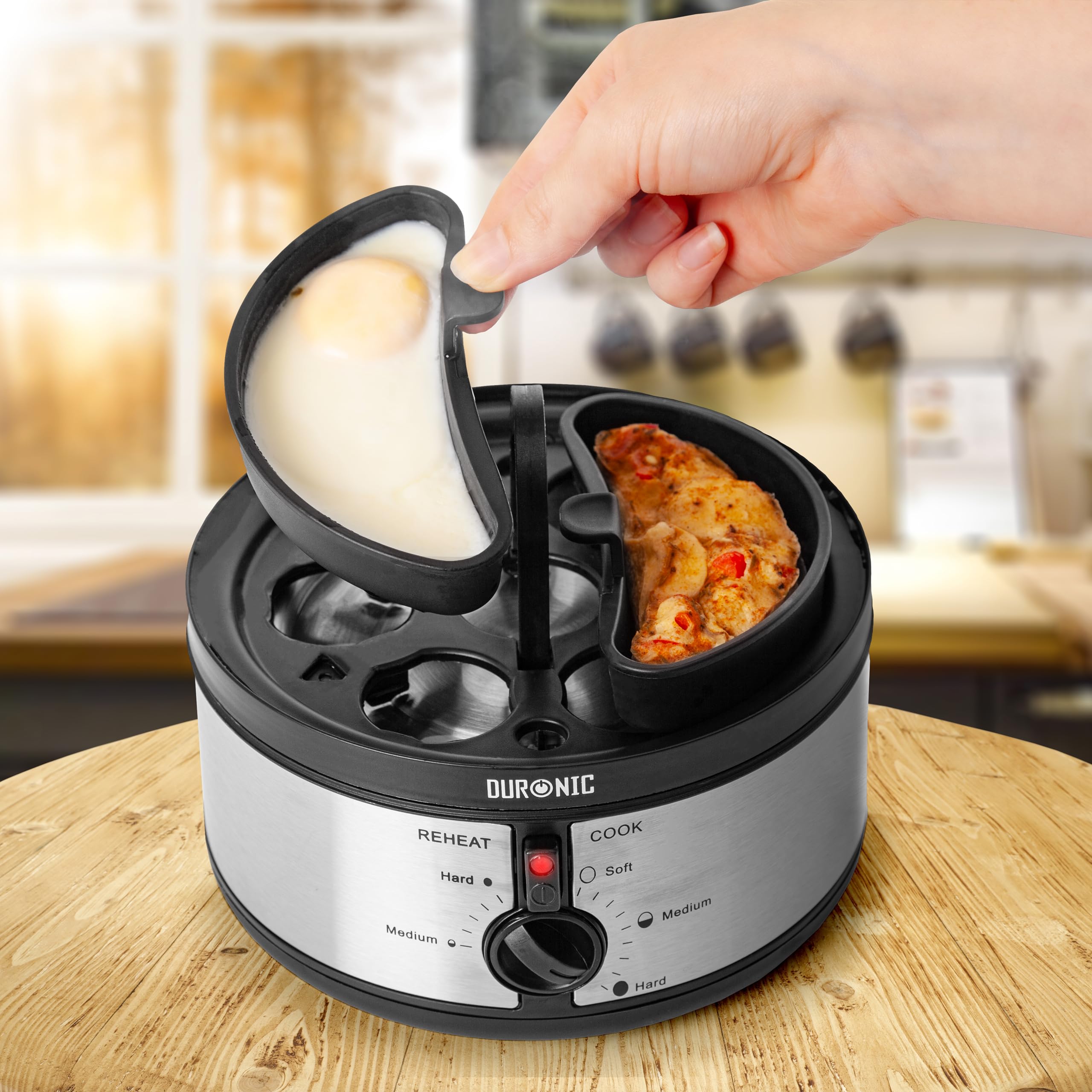 Zoomgoods EB35 BK electric egg boiler cooking omelettes perfectly using the omelette tray provided