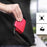 Zoomgoods HDC2 /RD red portable hard drive case being placed in a pocket to show how lightweight and portable it is